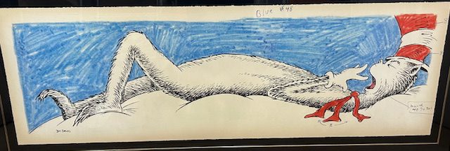 Dr. Seuss's Cat in the Hat character relaxing on a cloud with a blue background, in a whimsical, hand-drawn style.