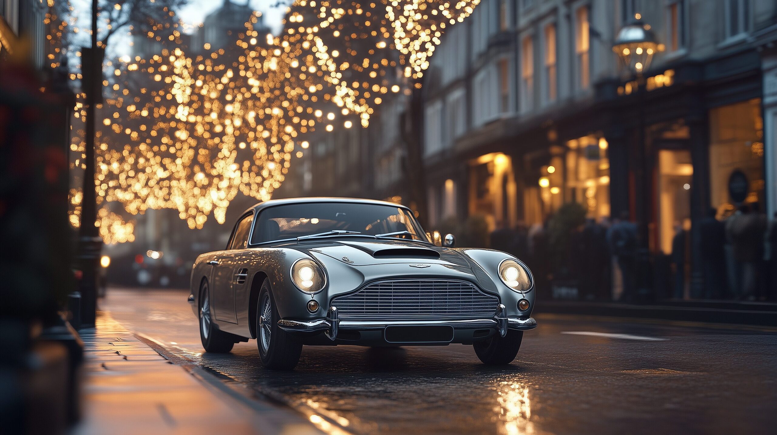 A classic Aston Martin DB5 drives down a wet city street adorned with sparkling string lights.