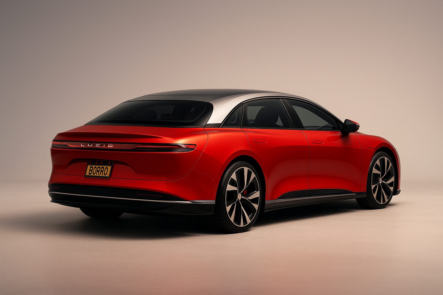 A red Lucid Air Dream Edition electric luxury sedan with a BORRO plate, photographed at a three-quarter rear angle on a clean studio surface with soft gradient lighting.